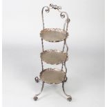 An Art Nouveau circular planished copper and wrought iron 3 tier cake stand 74cm h x 25cm diam.