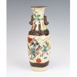 A Chinese crackle glazed vase decorated with warriors 28cm