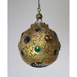 A pierced gilt metal and glass mosque style hanging lantern 25cm h x 18cm
