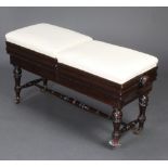A late Victorian rectangular mahogany adjustable duet piano stool raised on turned supports with H