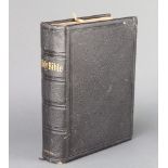 A leather bound Holy Bible, Old and New Testaments printed by University Press Oxford for The