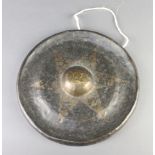 An Eastern circular metal gong 29cm diam.