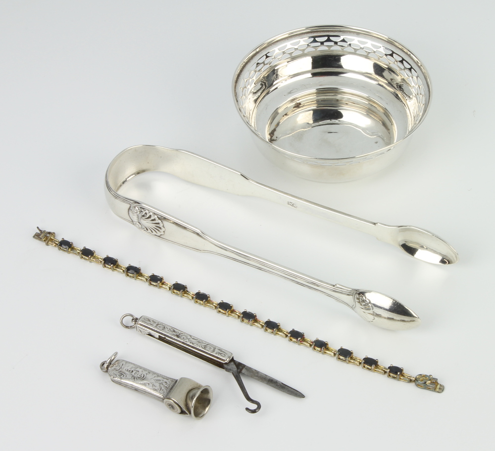 A pair of Victorian silver Kings pattern sugar tongs London 1824, ditto bowl, cigar cutter, pocket