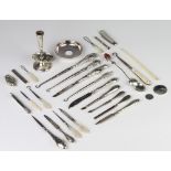 A collection of silver mounted sewing implements, spoons etc