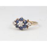 A 9ct yellow gold sapphire and diamond cluster ring 2.4 grams, size N 1/2