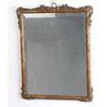 A rectangular bevelled plate mirror contained in a pierced gilt carved wood frame 44cm h x 37cm w