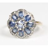 An Edwardian style yellow gold sapphire and diamond cluster ring size L, 2.8 grams
