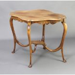 An Edwardian shaped bleached mahogany 2 tier occasional table raised on cabriole supports 71cm h x
