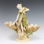 A Royal Dux Art Nouveau centrepiece with a lady sitting between 2 upturned shells no.1091 40cm One