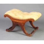 A Georgian style mahogany X framed stool the seat upholstered in bleached buttoned green leather