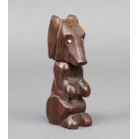 A 1920's carved wooden lighter in the form of a dog 10cm x 2cm x 4cm