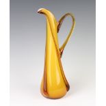 A Murano style orange ground glass jug 33cm