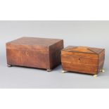 A 19th Century mahogany sarcophagus shaped twin compartment tea caddy raised on brass paw feet