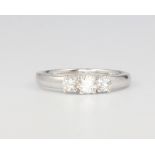 An 18ct white gold 3 stone diamond ring, approx. 0.5ct, colour H/I, clarity VS, size N