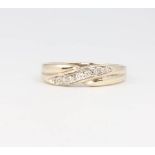 A 9ct yellow gold diamond ring 2.7 grams, size P