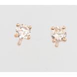 A pair of 18ct rose gold diamond ear studs, approx. 0.5ct