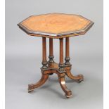 A Victorian octagonal figured walnut, quarter veneered and ebonised occasional table, raised on 4