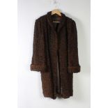 A lady's brown Persian lamb jacket