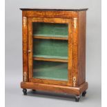 A Victorian inlaid walnut pier cabinet, fitted shelves enclosed by glazed panelled doors and with