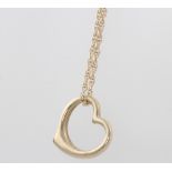 A 9ct yellow gold heart pendant and chain 2.6 grams