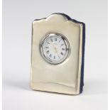 A modern silver timepiece with quartz movement 9cm