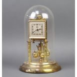 Schatz, a German 400 day clock with square silvered dial, Arabic numerals, contained under a plastic