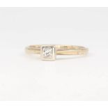 A 9ct yellow gold princess cut diamond ring 0.15ct, 1.5 grams, size J