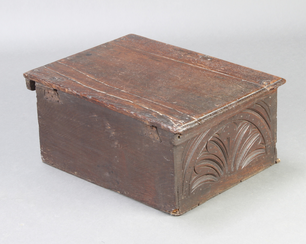An 18th/19th Century carved oak bible box with hinged lid and iron butterfly hinges, the apron - Image 2 of 3