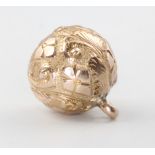A 9ct yellow gold ball charm 1.2 grams, 10mm