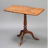 A 19th Century rectangular mahogany snap top wine table raised on a pillar and tripod base 69cm h
