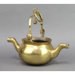 A 17th Century style polished bronze double spouted kettle with swing handle, the base marked Made