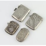 An Edwardian silver engraved vesta and 3 others, 71 grams