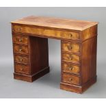 A Georgian bleached mahogany kneehole desk fitted secretaire drawer above 8 short drawers 78cm h x