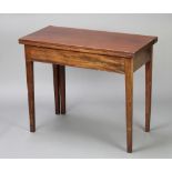 A Georgian rectangular mahogany tea table on square supports 75cm h x 90cm w x 44cm d Some scratches