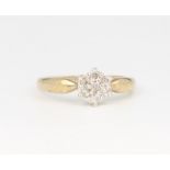 A 9ct yellow gold diamond cluster ring 0.25ct, 1.9 grams, size M 1/2
