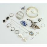 A silver bracelet and minor silver jewellery, 100 grams