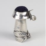 A Continental novelty silver pin cushion in the form of a toadstool with a leaf base and climbing