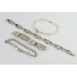 A silver bracelet and minor silver jewellery 100 grams