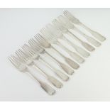 Ten Georgian silver fiddle pattern table forks, mixed dates and rubbed marks, 700 grams