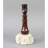 A 1930's turned and carved Cornish serpentine table lamp in the form of a lighthouse 23cm h x 10cm d