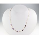 A 9ct yellow gold 4 stone diamond and 5 stone amethyst necklace, the amethysts 2ct, the diamonds 0.