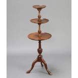 A Georgian style circular mahogany 3 tier dumb waiter raised on pillar and tripod base 100cm h x