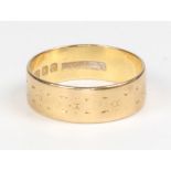 A 22ct yellow gold wedding band 4.4 grams, size M