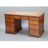 A 19th Century bleached mahogany free standing pedestal dressing table/desk fitted 1 long and 8