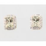 A pair of 9ct yellow gold topaz and diamond ear studs 2.4 grams, 8mm