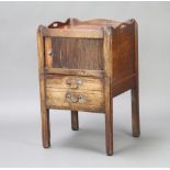 A George III mahogany tray top commode, the upper section enclosed by a tambour shutter the base