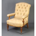 A Victorian inlaid mahogany open armchair, the back upholstered in yellow buttoned material,