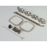A silver bracelet and minor silver jewellery 148 grams