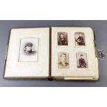 A Victorian leather bound photograph album containing black and white photographs