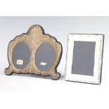 A modern double repousse silver photo frame 18cm, a rectangular ditto rubbed marks